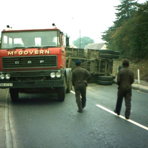 Roydon Road Stanstead Abbotts. Yet another calamity at the bottom of Cats Hill. After many hours the trailer was finally turned upright and reloaded. Photo 1980 ?
