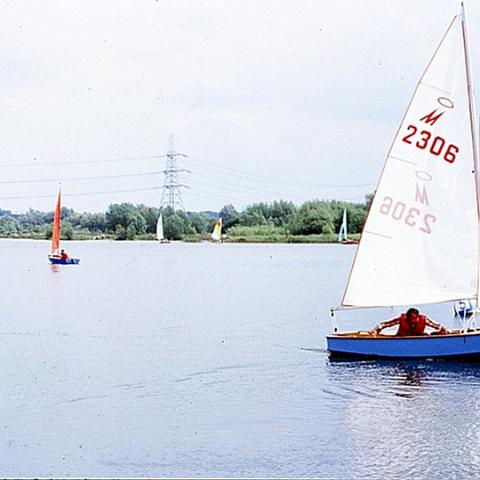 The sailing lake, Marsh Lane. The largest of the lakes it was originally known as the "Six Pit" due to Saint Albans sand and gravel plan. It was stocked with fish by the Abbotts Angling Society and contains large Carp, Tench and Bream. Photo 1980